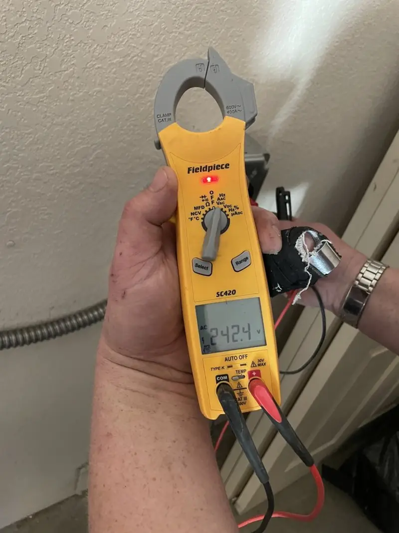 Voltage testing with clamp meter during Electrical Installation Services in Rock Hill